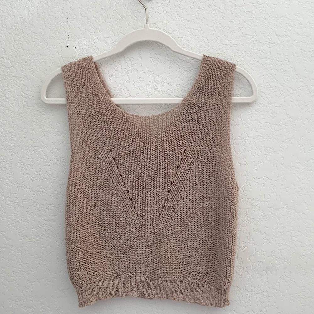 Tan woven sleeves top.